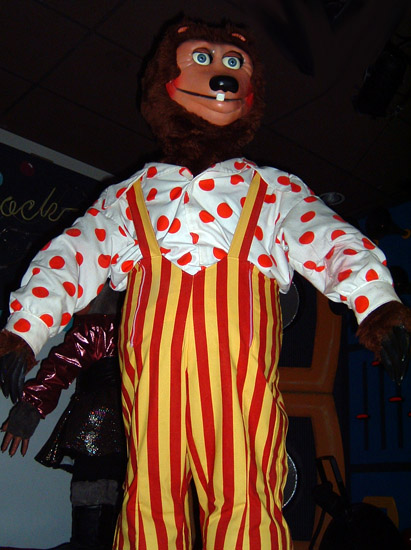 The skinnier and shorter New Billy Bob animatronic, with a white shirt with red polka dots under his signature overalls.