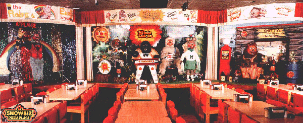 A digitally animated gif of the Rock-afire Explosion performing with a small Showbiz Pizza logo.