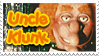 A stamp of the uncle klunk animatronic with text saying uncle klunk.
